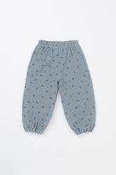 Avauma Breeze Jogger Pants in deepblue flower print, lightweight baby pants in flat lay view.